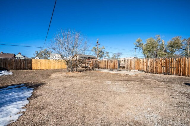 rear view of house with fence private yard, a patio area, and stucco siding