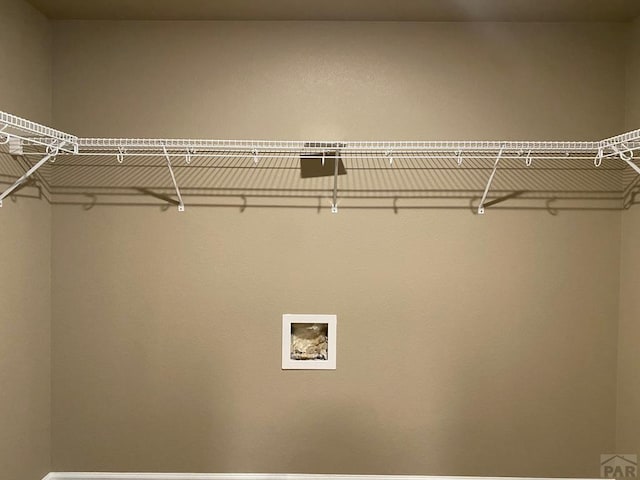 clothes washing area featuring laundry area and washer hookup