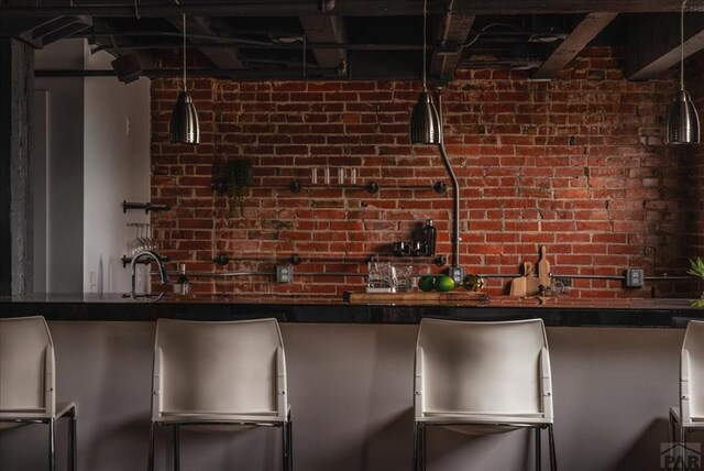 bar featuring brick wall