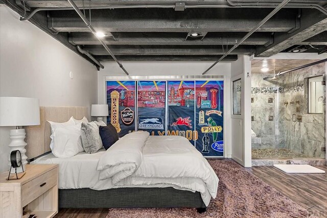 bedroom featuring dark wood-type flooring