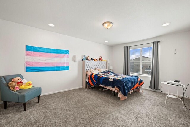 carpeted bedroom featuring recessed lighting and baseboards