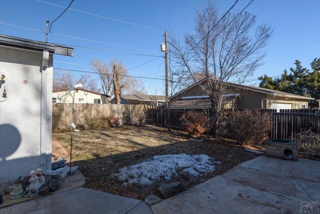 view of yard with a patio area and fence