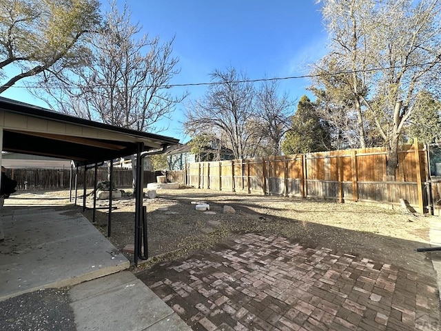 view of yard featuring a fenced backyard and a patio