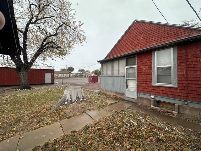 view of side of property with fence