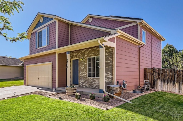 3603 Bobcat Ln, Pueblo, CO 81005 - view of front of property with an attached garage and concrete driveway