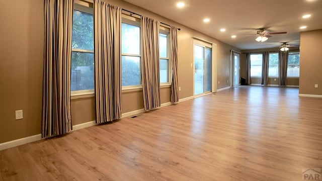 spare room featuring recessed lighting, baseboards, visible vents, and light wood finished floors