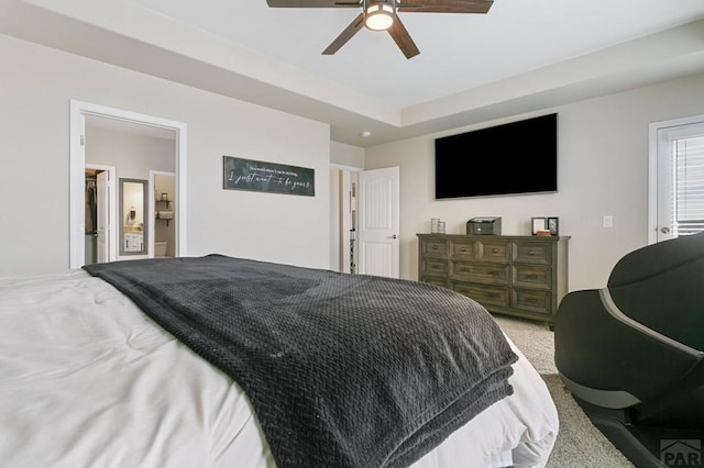 carpeted bedroom with a ceiling fan