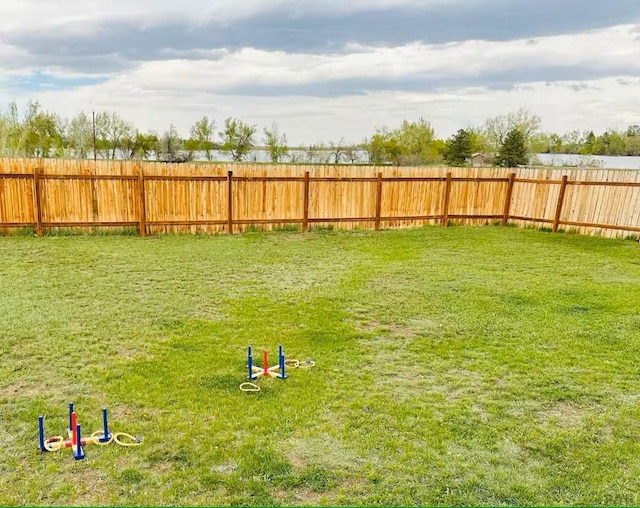 view of yard with fence