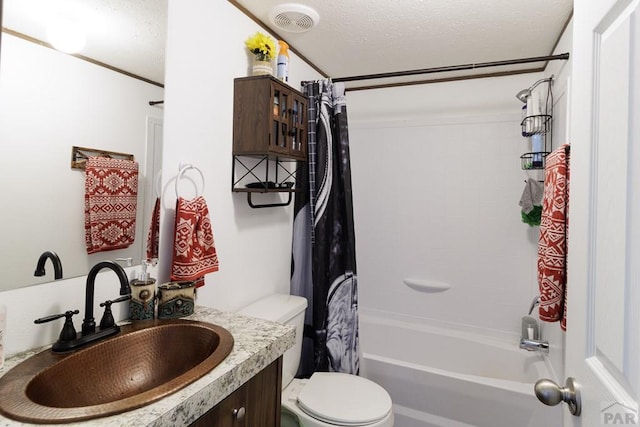 full bathroom with shower / bath combination with curtain, visible vents, toilet, a textured ceiling, and vanity