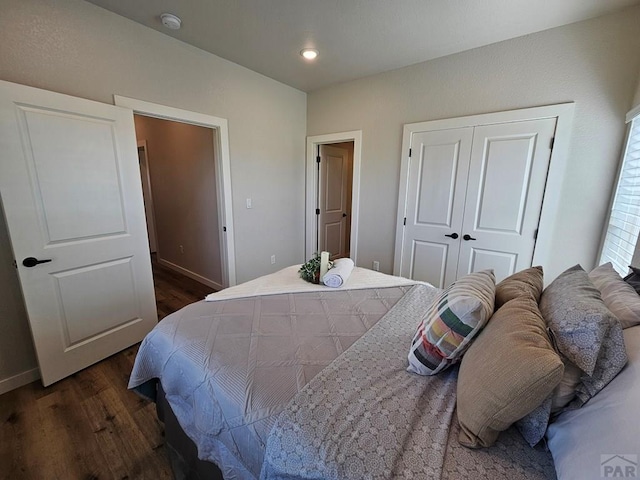 28781 County Rd 24.6, Springfield, CO 81073 - bedroom with dark wood-style floors, a closet, baseboards, and recessed lighting
