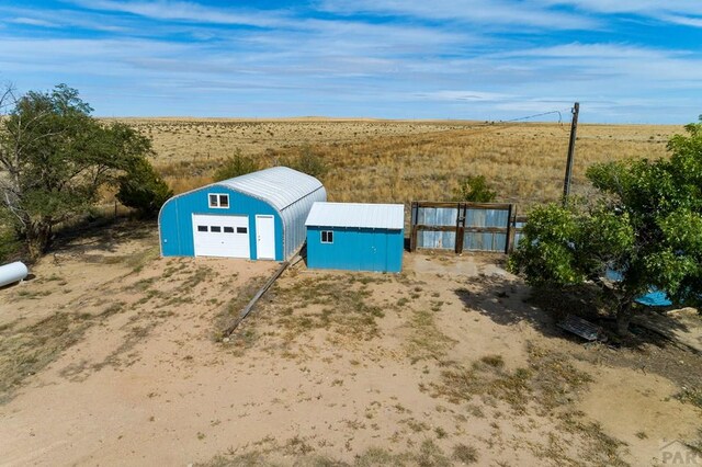 exterior space with an outbuilding