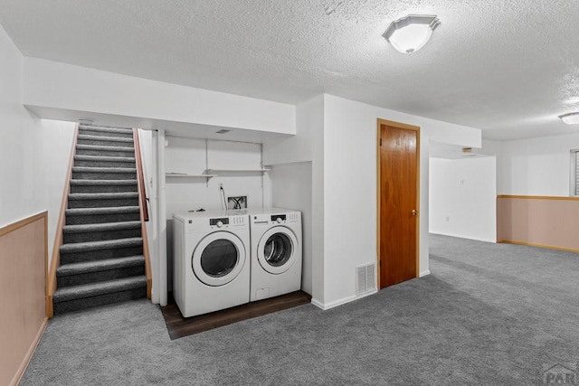 2800 Wills Blvd, Pueblo, CO 81003 - washroom with independent washer and dryer, carpet, and a textured ceiling