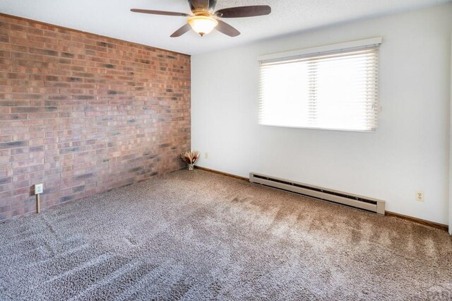 empty room featuring carpet floors, a baseboard radiator, and baseboards