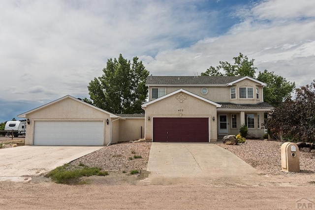 477 S Venango Dr, Pueblo West, CO 81007 - traditional-style home featuring stucco siding, driveway, and an attached garage