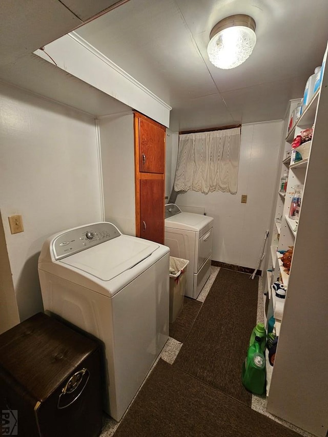 laundry room with laundry area and washing machine and clothes dryer