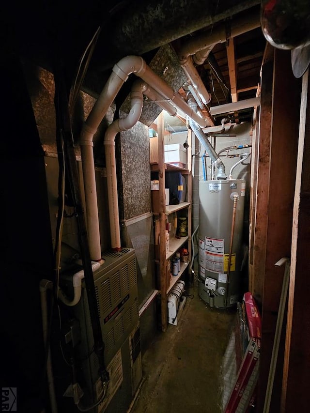 utility room with gas water heater