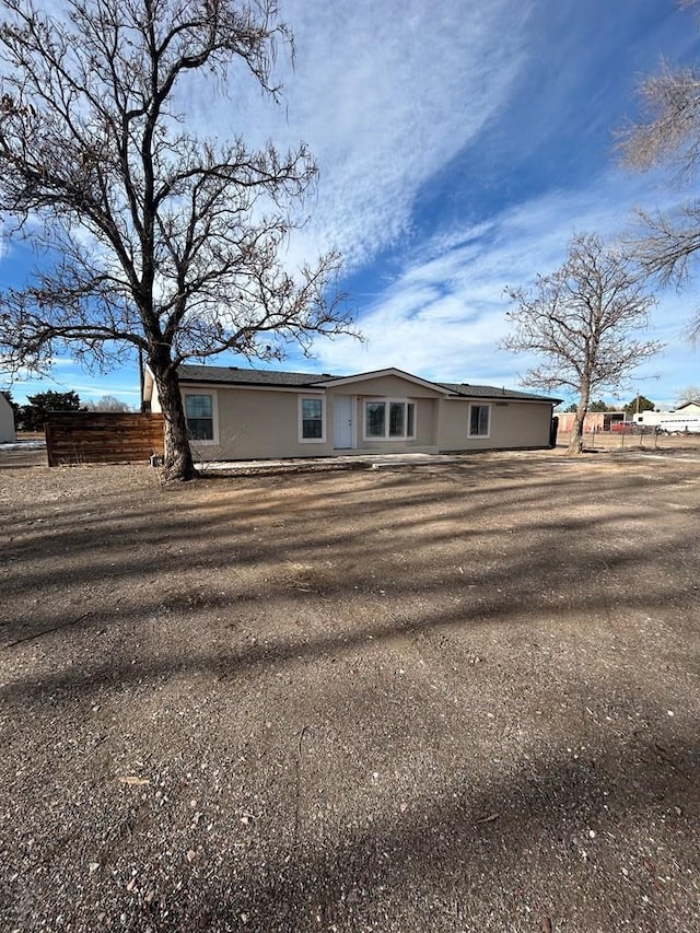 view of front of home with fence