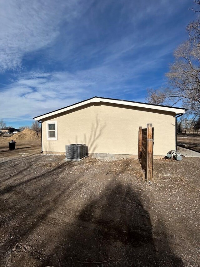 view of home's exterior featuring central air condition unit