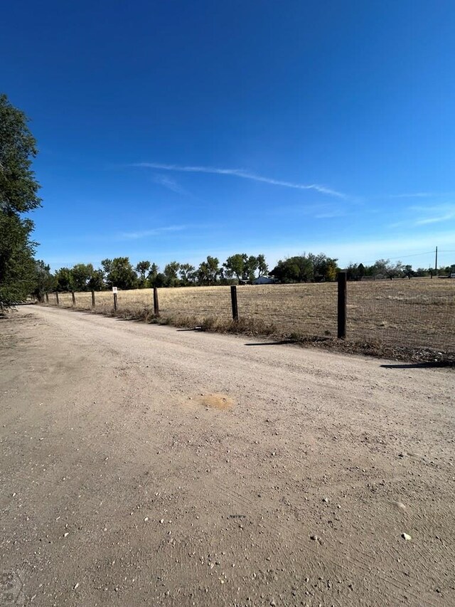 view of yard featuring a rural view