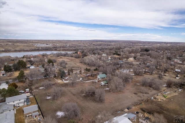 drone / aerial view with a water view