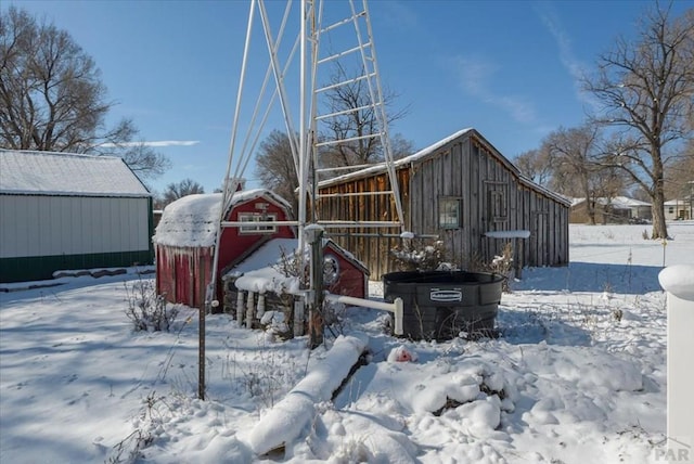 view of snow covered property