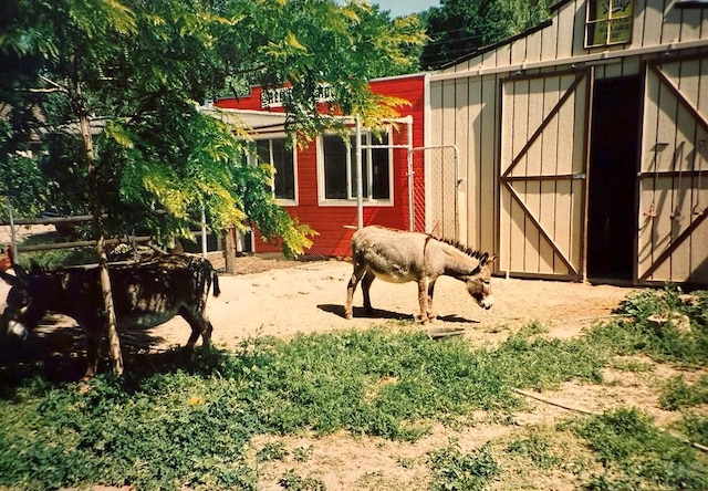 view of outbuilding featuring an outdoor structure and an exterior structure