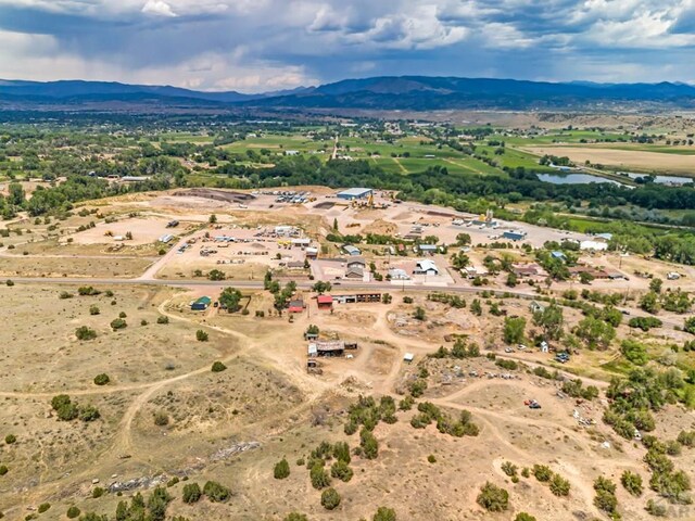 aerial view with a water and mountain view