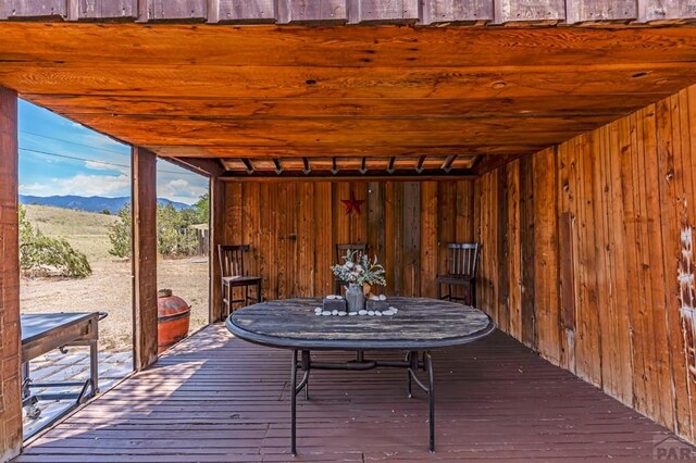 wooden deck featuring a mountain view