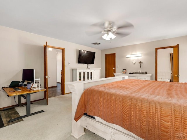 carpeted bedroom featuring visible vents and ceiling fan