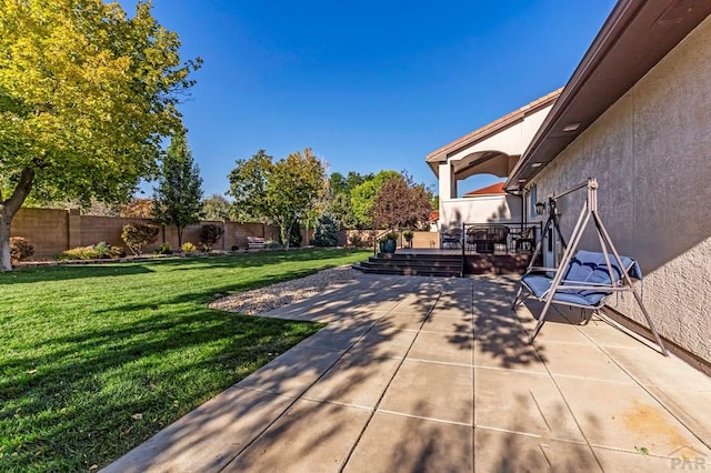 view of patio / terrace featuring a fenced backyard and a wooden deck