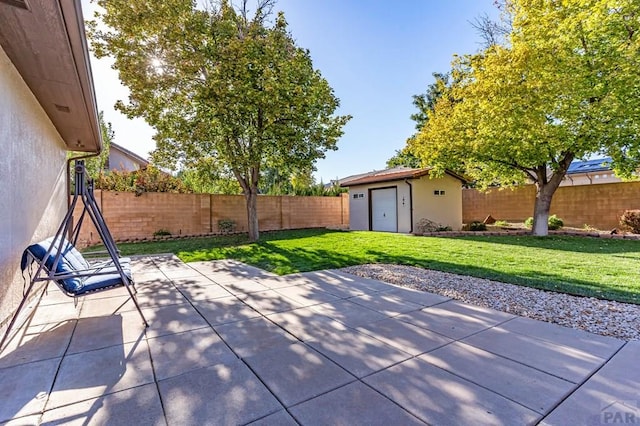 view of patio / terrace featuring an outdoor structure and a fenced backyard