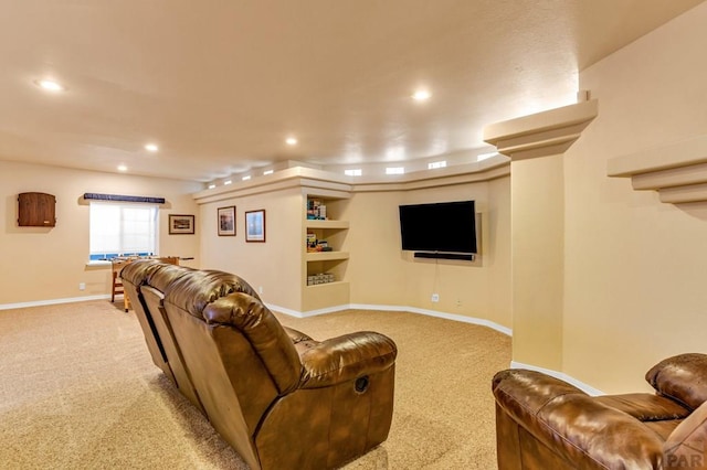 living area featuring light carpet, baseboards, and recessed lighting