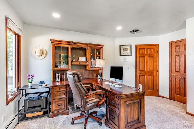 office area featuring a baseboard radiator, recessed lighting, visible vents, and light colored carpet