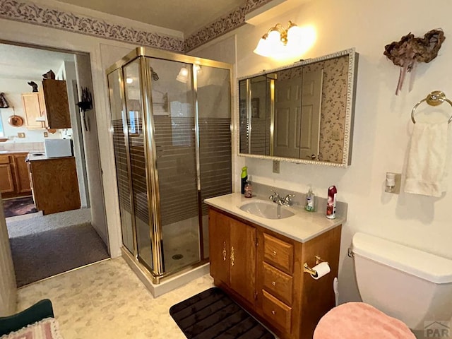 full bath with toilet, a shower stall, and vanity