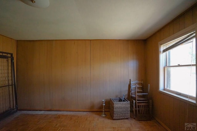 interior space featuring wooden walls