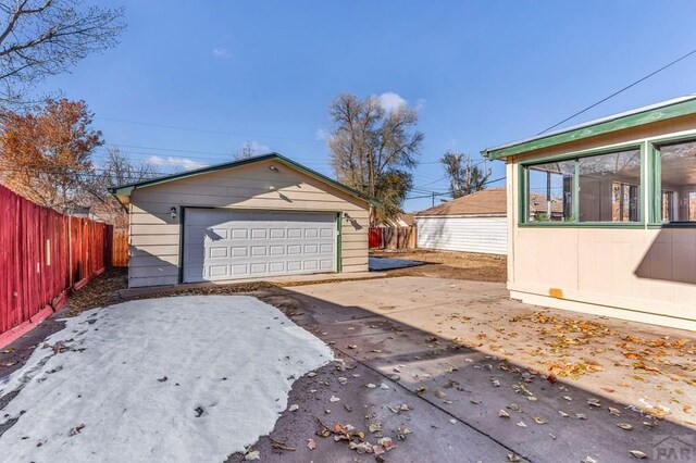 detached garage with fence