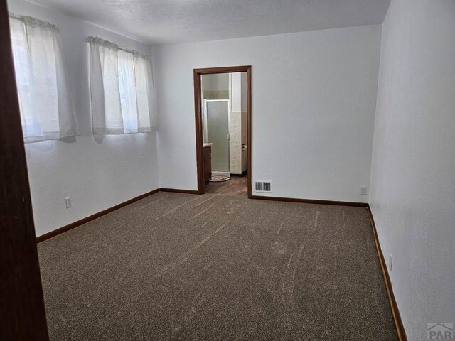 1640 Wabash Ave, Pueblo, CO 81004 - carpeted spare room with baseboards