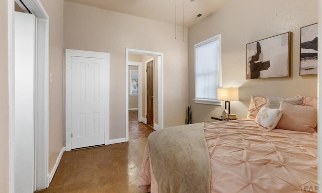 bedroom with baseboards