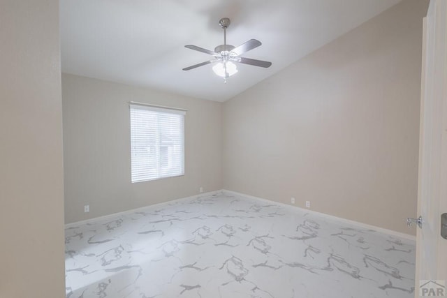 7639 Sandy Springs Pt, Fountain, CO 80817 - unfurnished room featuring ceiling fan, lofted ceiling, marble look tile flooring, and baseboards