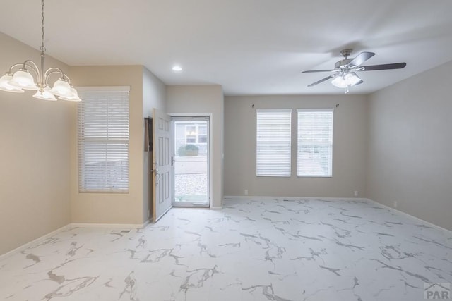 7639 Sandy Springs Pt, Fountain, CO 80817 - foyer entrance featuring light marble finish flooring, baseboards, a chandelier, ceiling fan, and recessed lighting