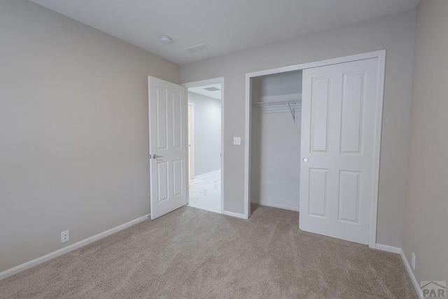 7639 Sandy Springs Pt, Fountain, CO 80817 - unfurnished bedroom with carpet floors, a closet, and baseboards