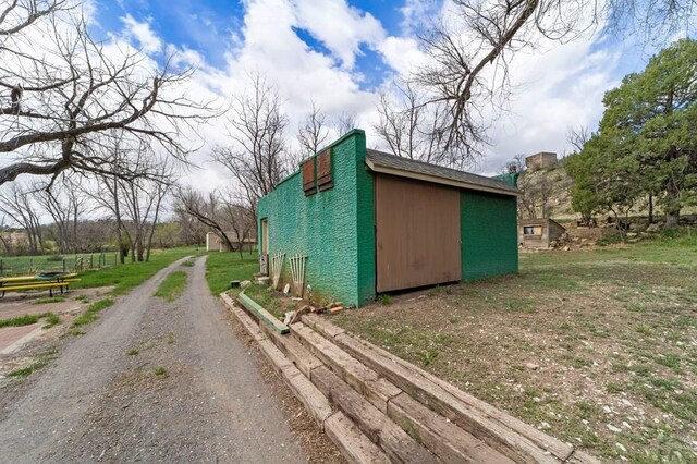 10511 Apache City Rd, Rye, CO 81069 - view of outdoor structure with driveway and an outdoor structure