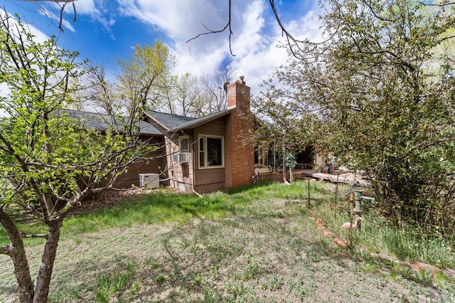 10511 Apache City Rd, Rye, CO 81069 - exterior space featuring central AC unit and a chimney