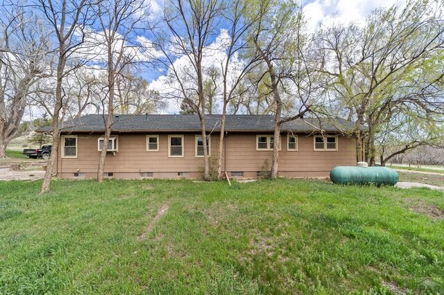 10511 Apache City Rd, Rye, CO 81069 - rear view of house featuring a yard and crawl space