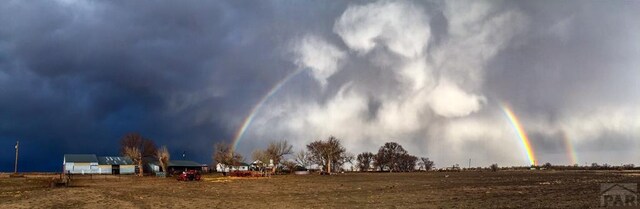 view of community with a rural view