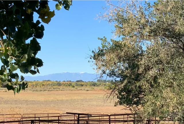 mountain view featuring a rural view