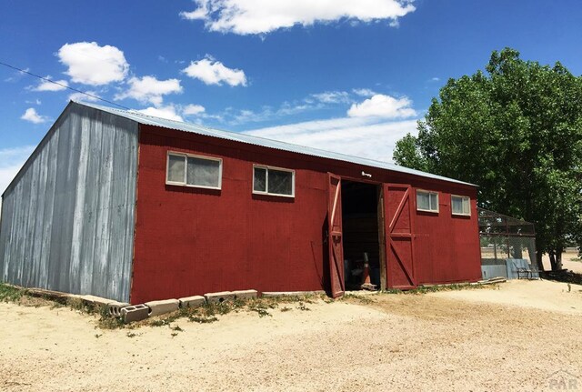 view of outbuilding with an outbuilding