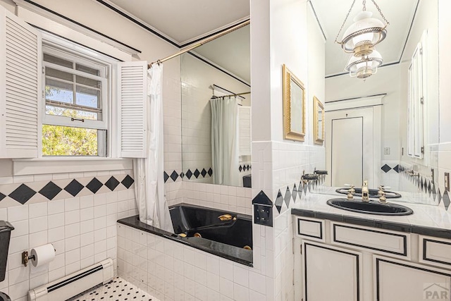 full bathroom featuring a baseboard radiator, a notable chandelier, and vanity