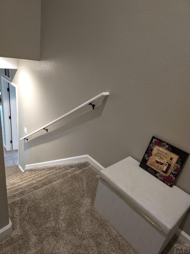 980 N Purcell Blvd, Pueblo West, CO 81007 - staircase with visible vents, baseboards, and carpet flooring