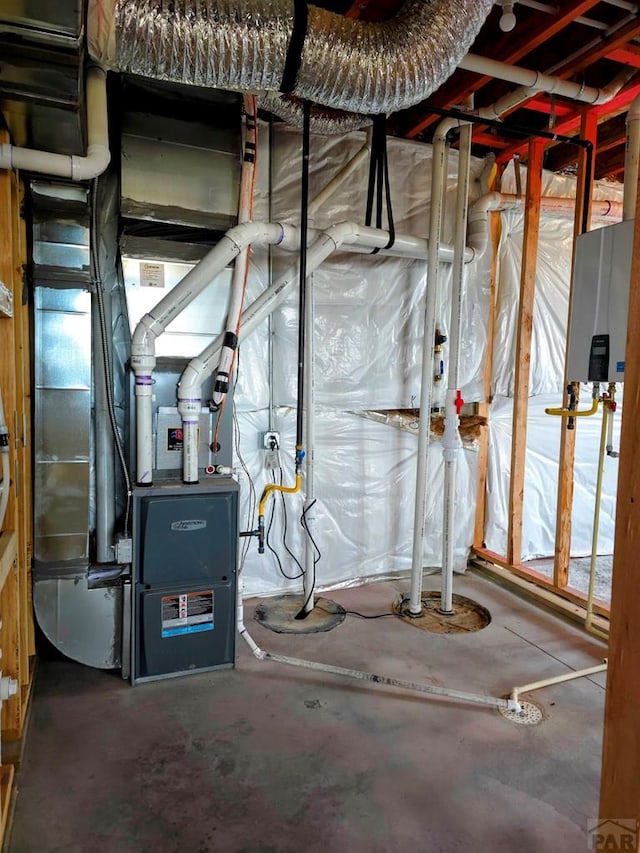 980 N Purcell Blvd, Pueblo West, CO 81007 - utility room with tankless water heater